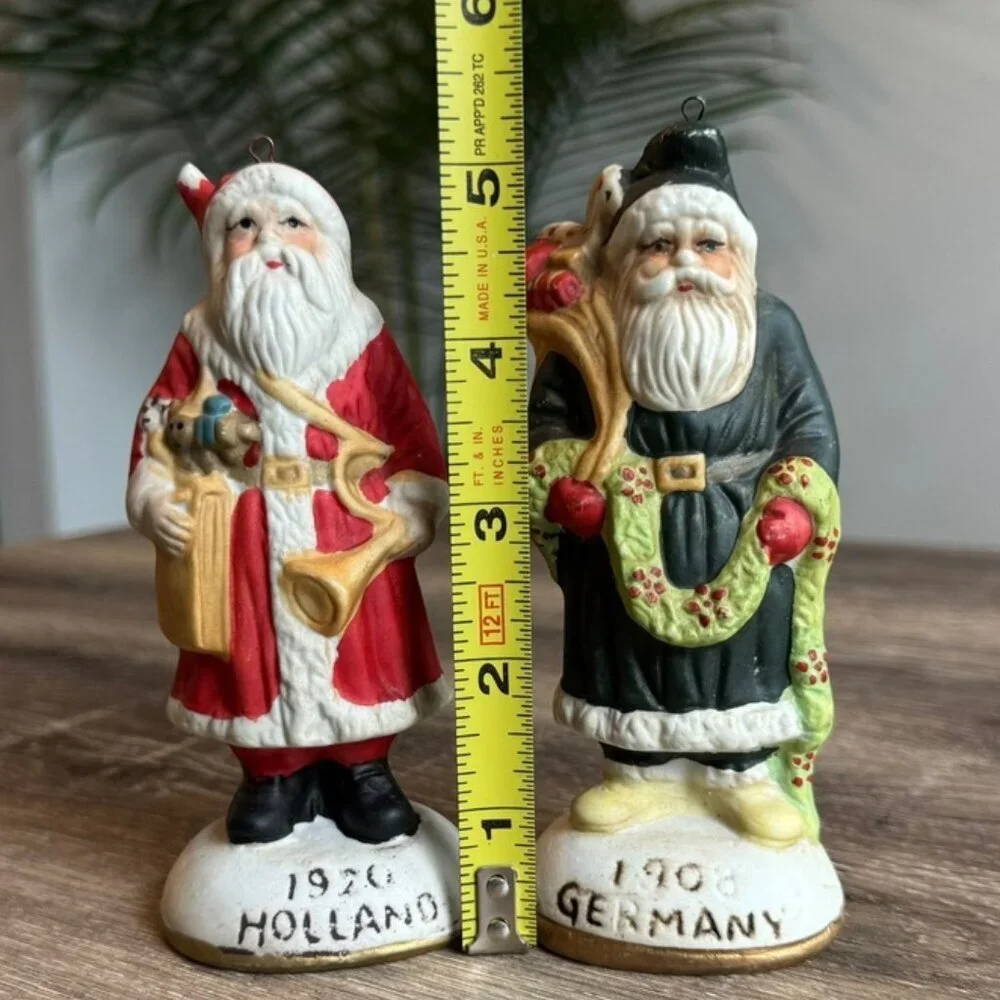 Set of 2, Around The World Collection of Santa Claus Figurine's.
